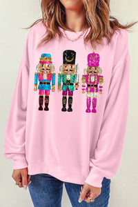 Nutcracker Graphic Round Neck Long Sleeve Sweatshirt Trendsi