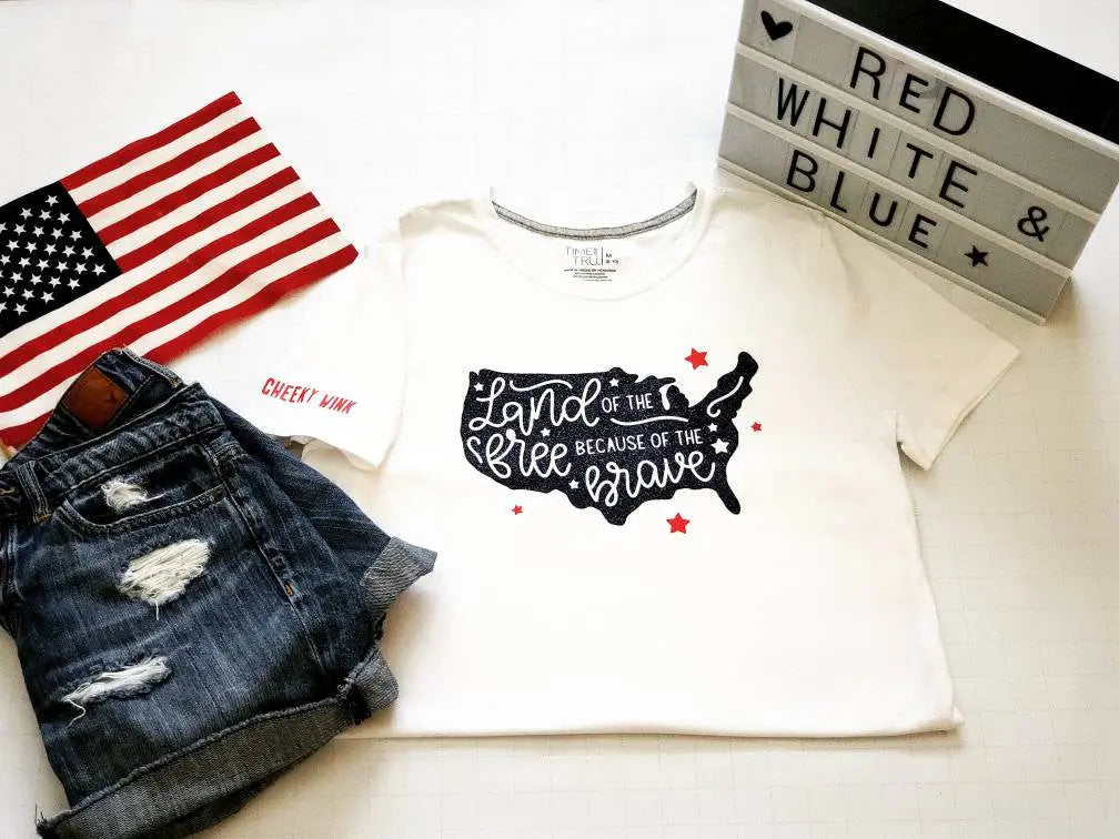 Land of the Free because of the Brave Cotton Patriotic Tee. Ladies and Youth Holiday shirts. - The Cheeky Wink